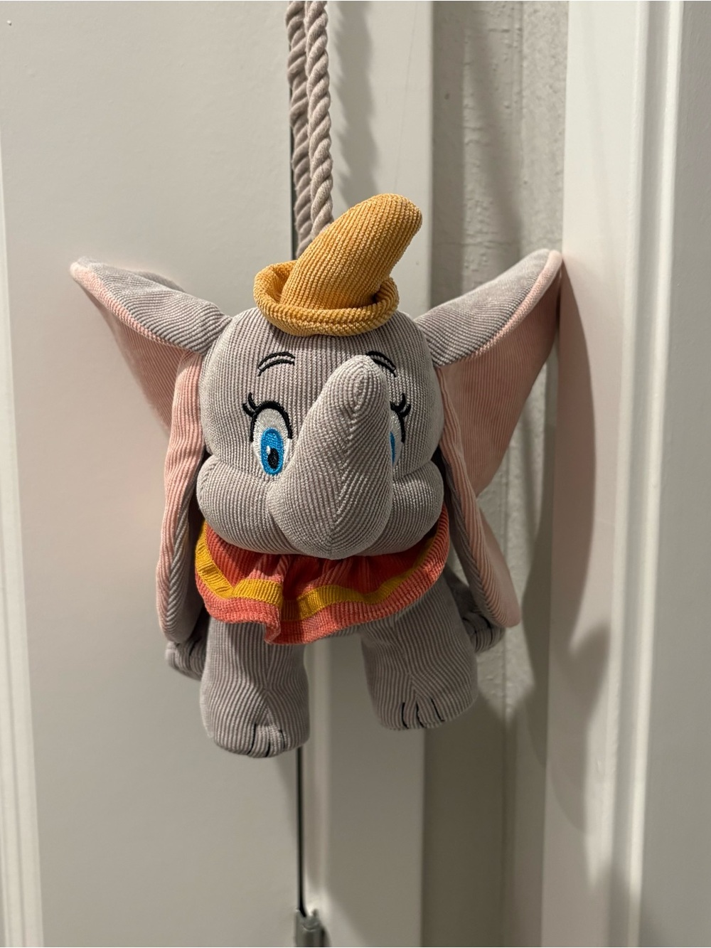 Grey Dumbo Elephant Plush Pull-String Toy and small backpack